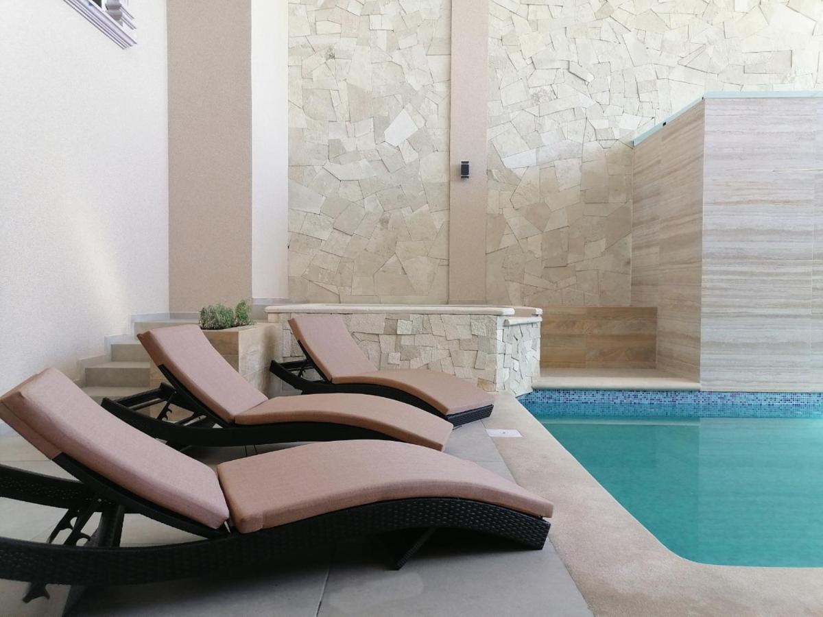 Hotel Feria Jalisciense à San Juan de los Lagos Extérieur photo