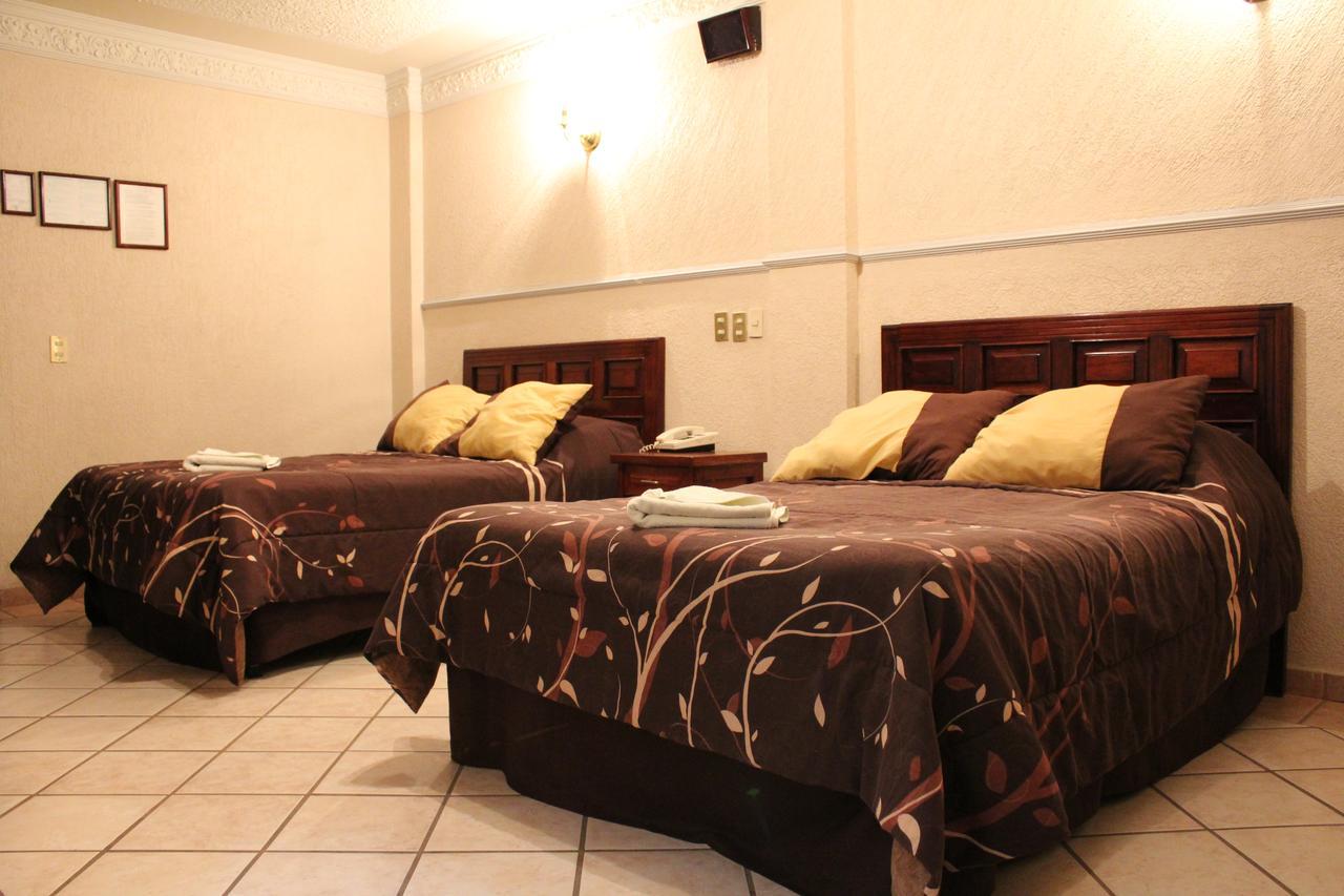 Hotel Feria Jalisciense à San Juan de los Lagos Extérieur photo
